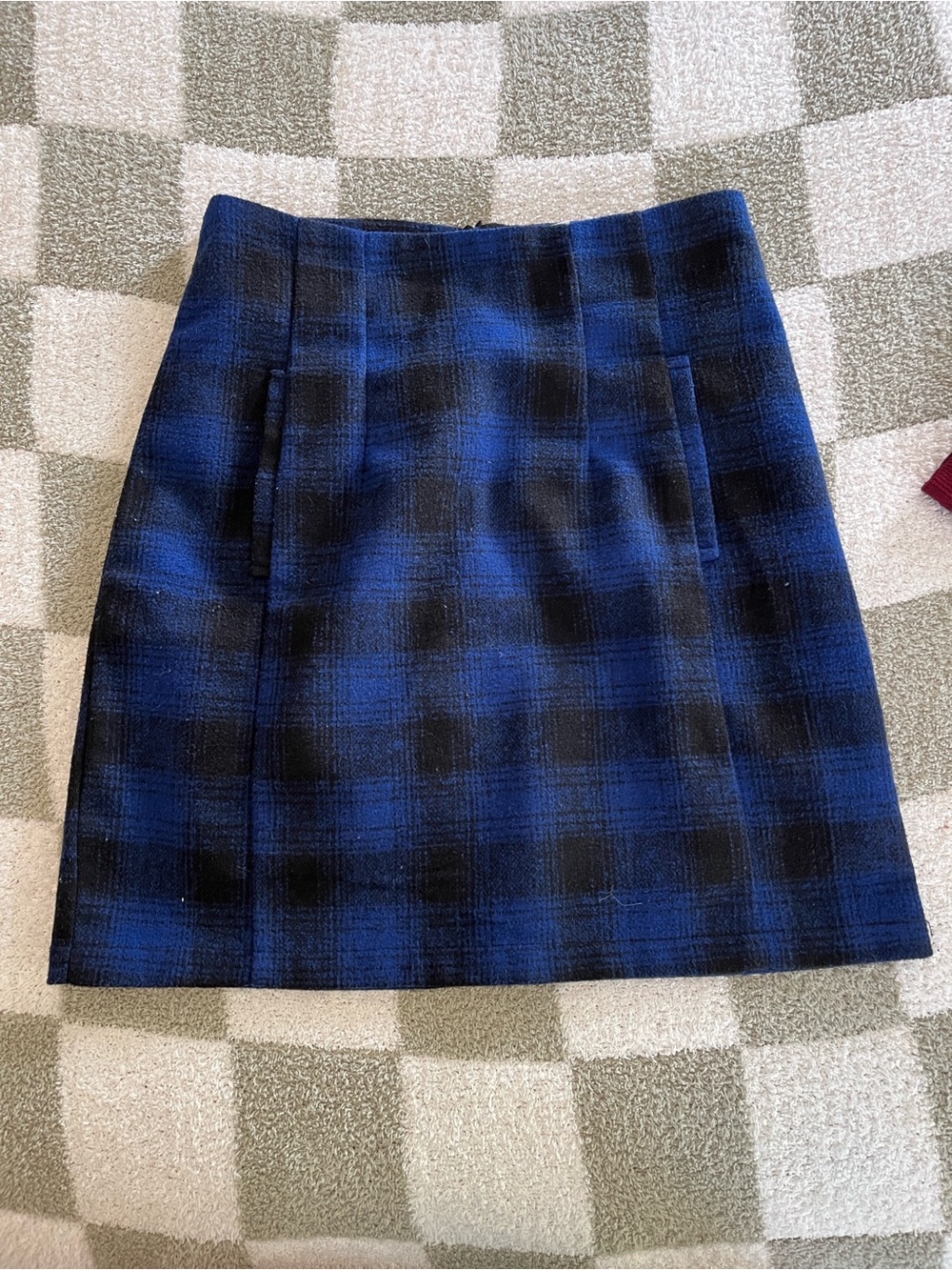 Delia’s mini plaid skirt
